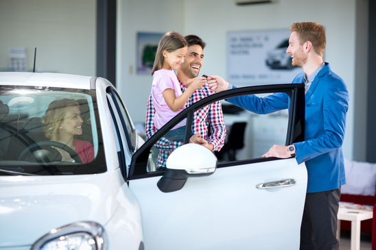 The Fair Credit Reporting Act Summary You Can Use to Train Your Staff 1 Sales manager at a showroom car with young family as buyers